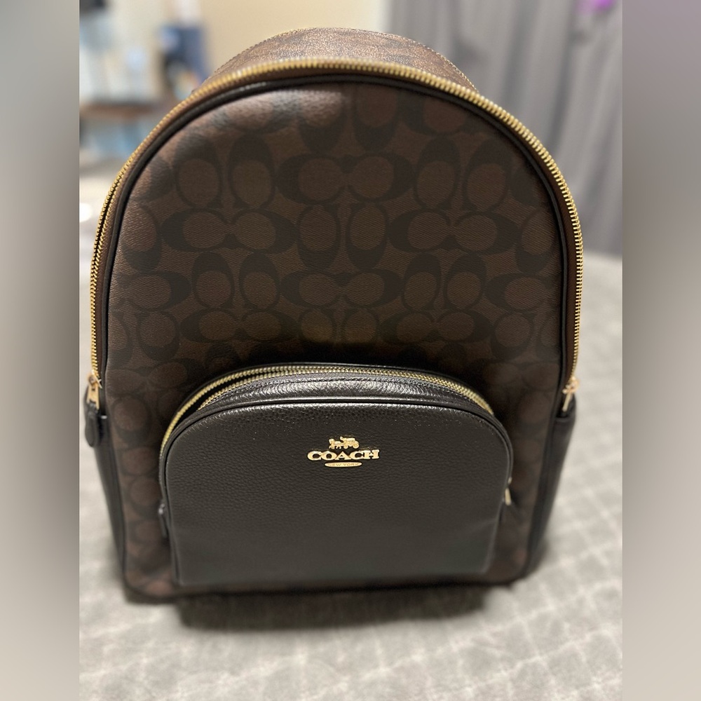 Coach backpack, dark brown, practically brand new, no rips, stains or tears